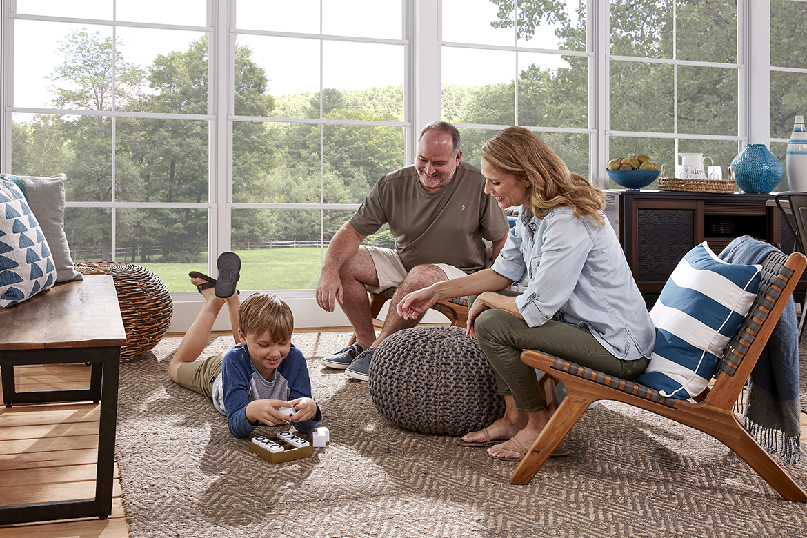 Family enjoys time together in their three season sunroom